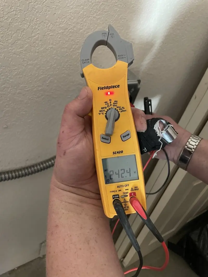 Voltage testing with clamp meter during Generator Installation in Allen